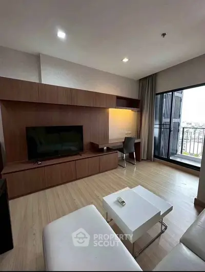 Modern living room with sleek wooden furniture and city view balcony, perfect for urban living.