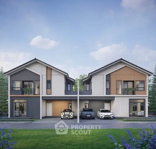 Modern duplex house with sleek design and spacious driveway