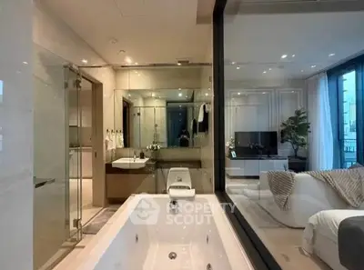 Luxurious modern bathroom with glass wall overlooking elegant living room in upscale apartment.