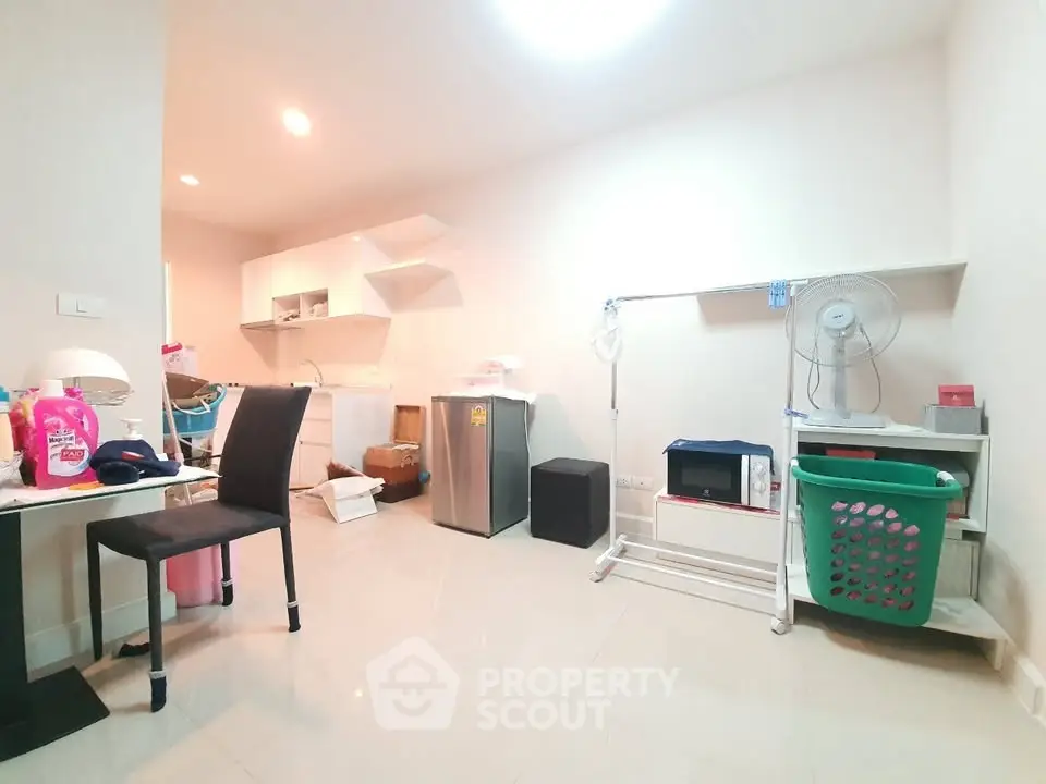 Spacious interior with modern appliances and ample storage, perfect for urban living.