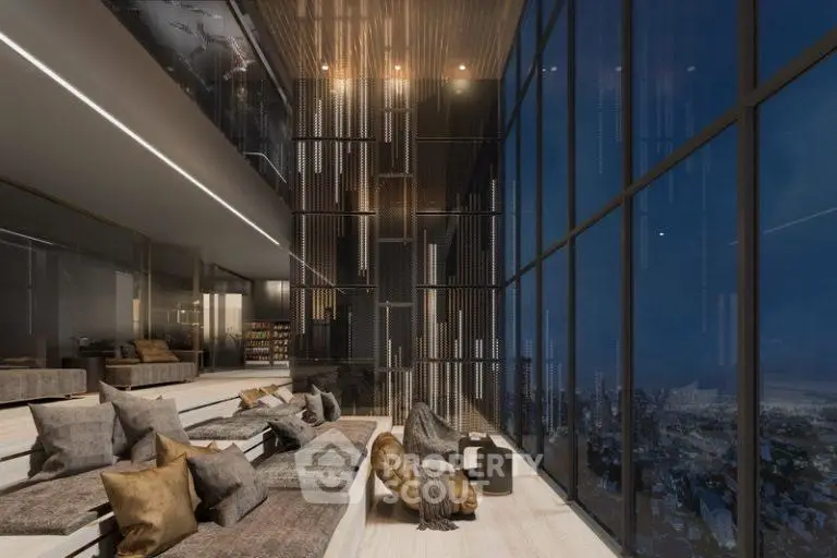 Luxurious modern living room with floor-to-ceiling windows and stunning city view at night.