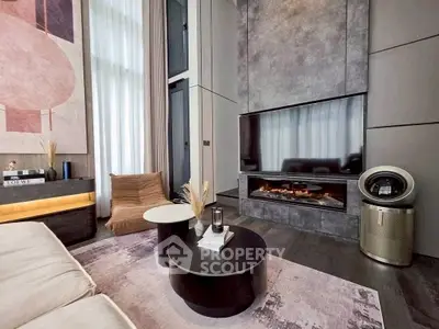 Luxurious modern living room with high ceilings, elegant decor, and a cozy fireplace.