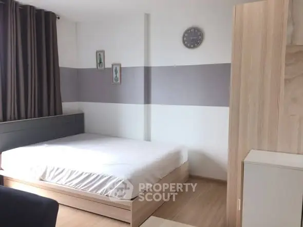 Modern minimalist bedroom with natural light and stylish decor