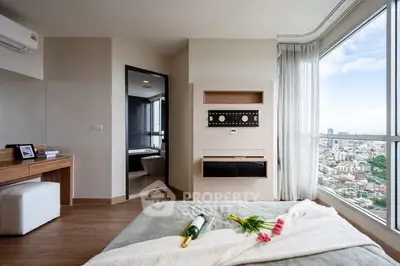 Luxurious bedroom with stunning city view and modern decor