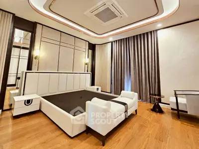 Luxurious modern bedroom with elegant decor and spacious layout