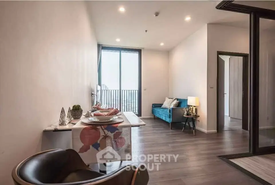 Modern living room with sleek design and balcony view