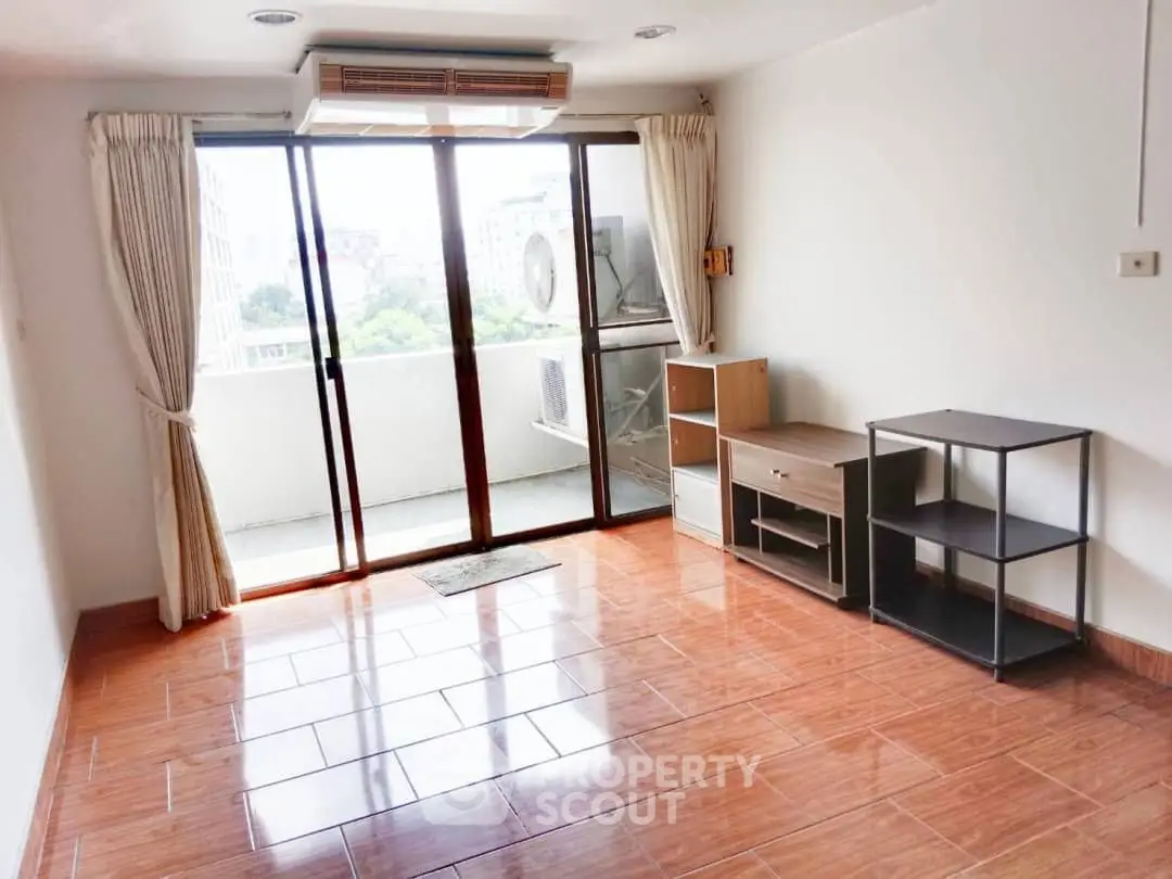 Bright modern living room with sleek furniture and large windows