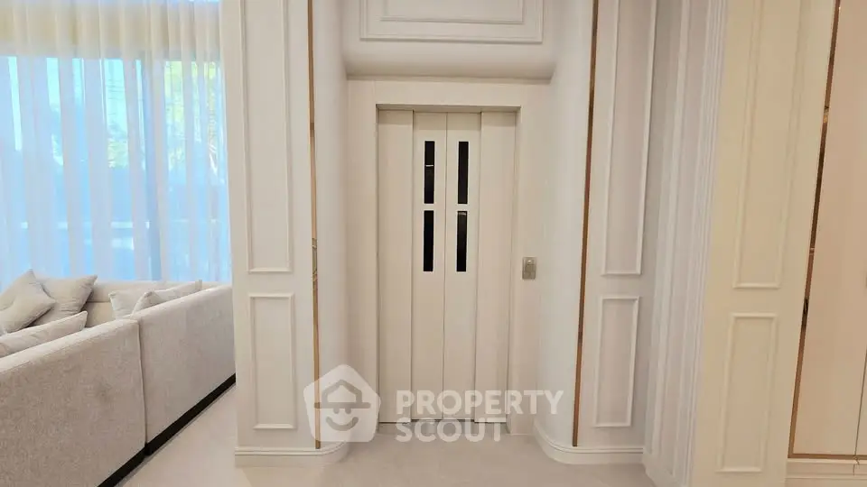 Luxurious home interior with private elevator and elegant decor