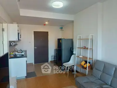 Modern living room with open kitchen and stylish furniture