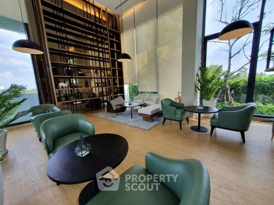 Luxurious modern living room with high ceilings, elegant furniture, and large windows offering garden views.