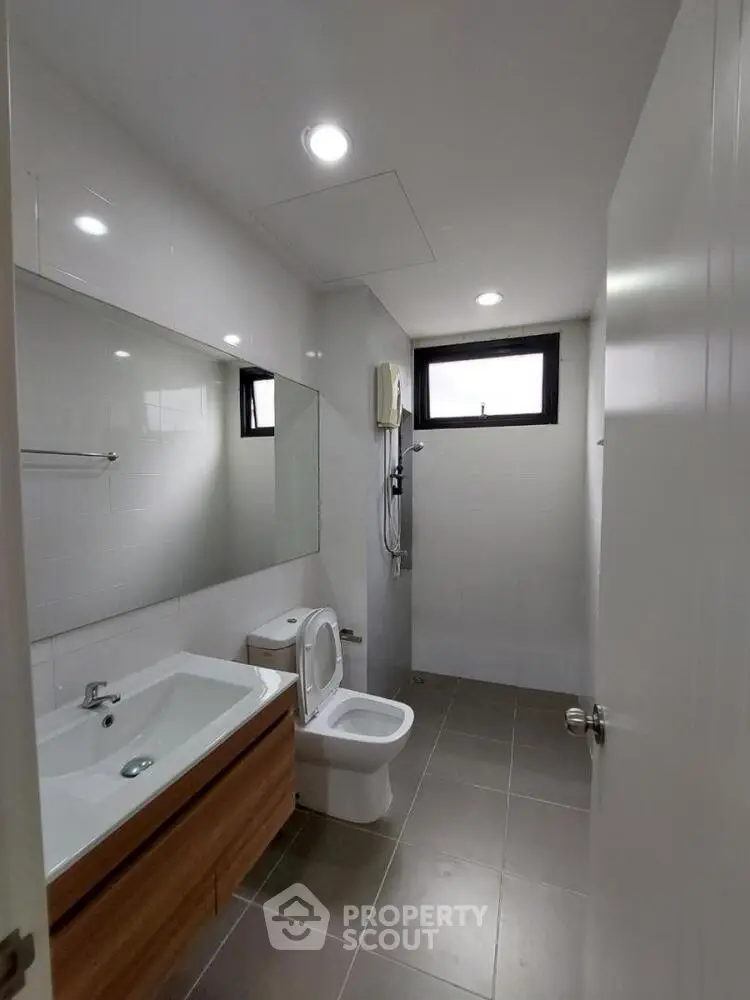 Modern bathroom with sleek fixtures and natural light