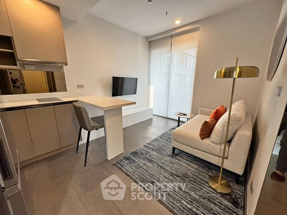 Modern compact living room with integrated kitchen and stylish decor