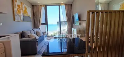 Modern living room with stunning ocean view and stylish decor