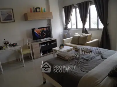 Cozy studio apartment with modern decor and natural light