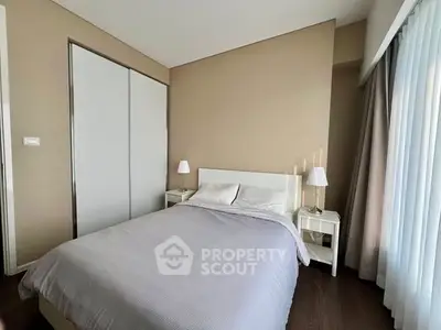 Modern bedroom with minimalist decor and natural light