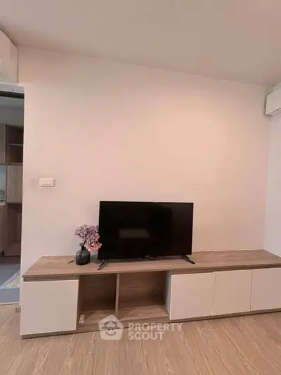 Modern living room with sleek TV stand and minimalist decor