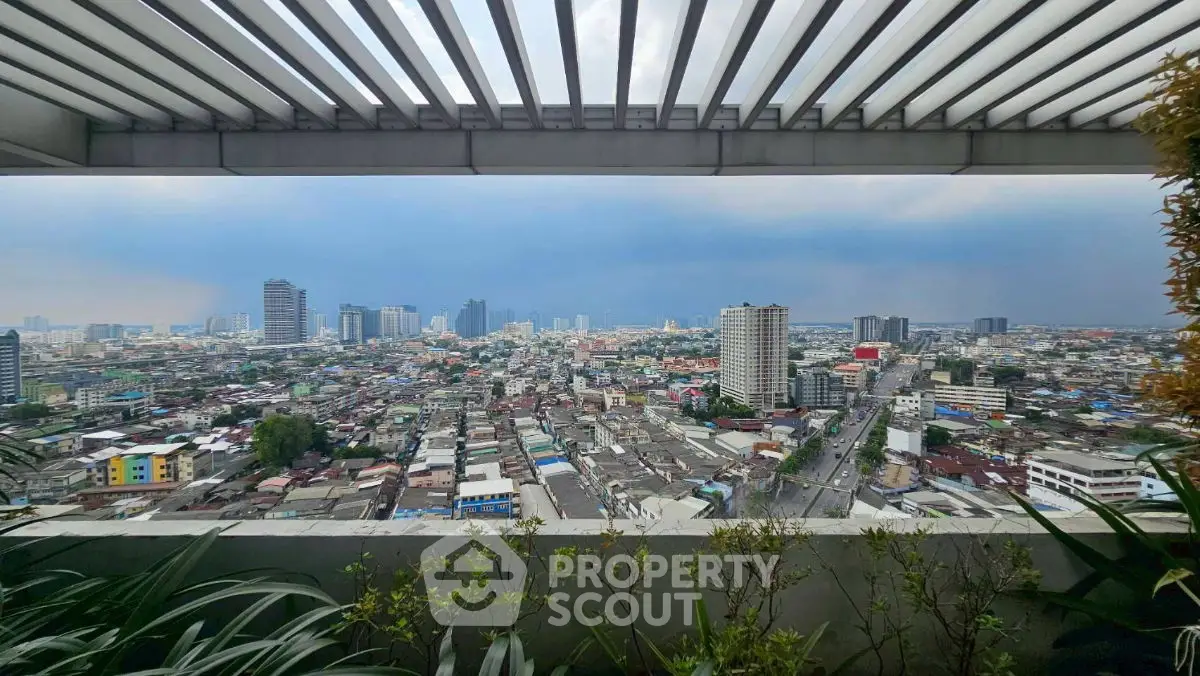 Stunning cityscape view from a modern balcony with lush greenery