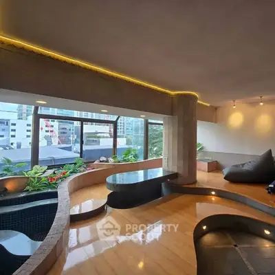 Luxurious living room with modern design and city view, featuring unique architectural elements.
