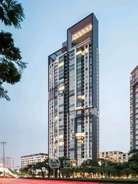 Stunning modern high-rise building with sleek design and panoramic city views, perfect for urban living.