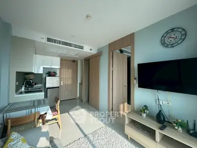 Modern living room with open kitchen and stylish decor