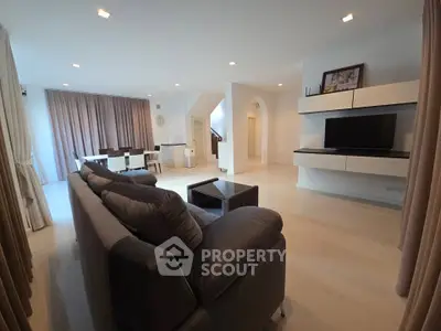 Spacious modern living room with elegant decor and ample natural light