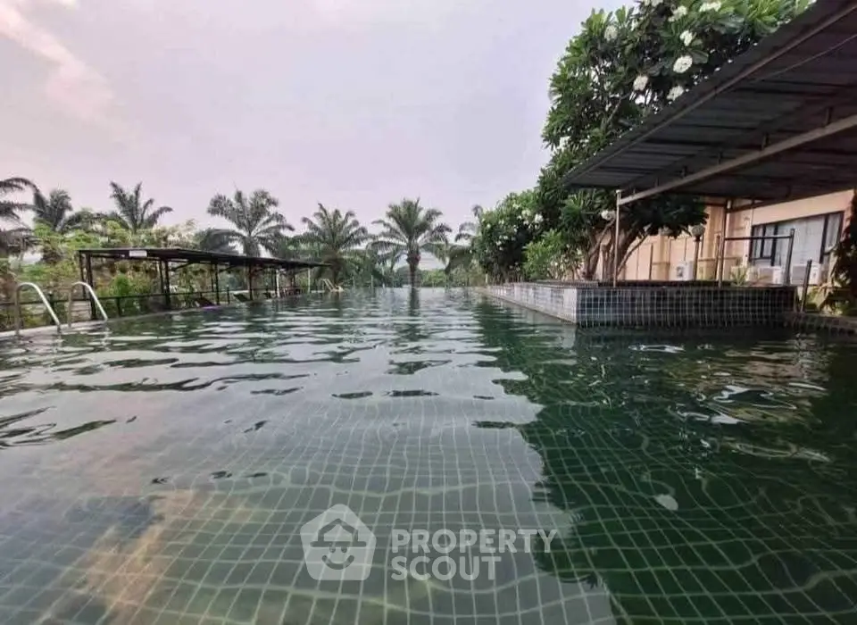 Luxurious infinity pool with lush greenery and serene ambiance