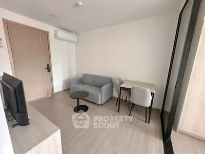 Modern living room with minimalist furniture and sleek design, perfect for urban living.