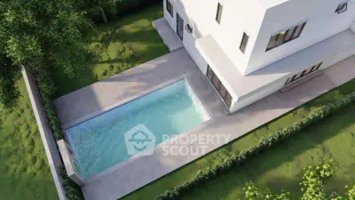 Modern home with sleek pool and lush garden, perfect for luxury living.