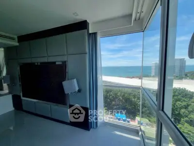 Stunning corner unit with panoramic ocean view and floor-to-ceiling windows.