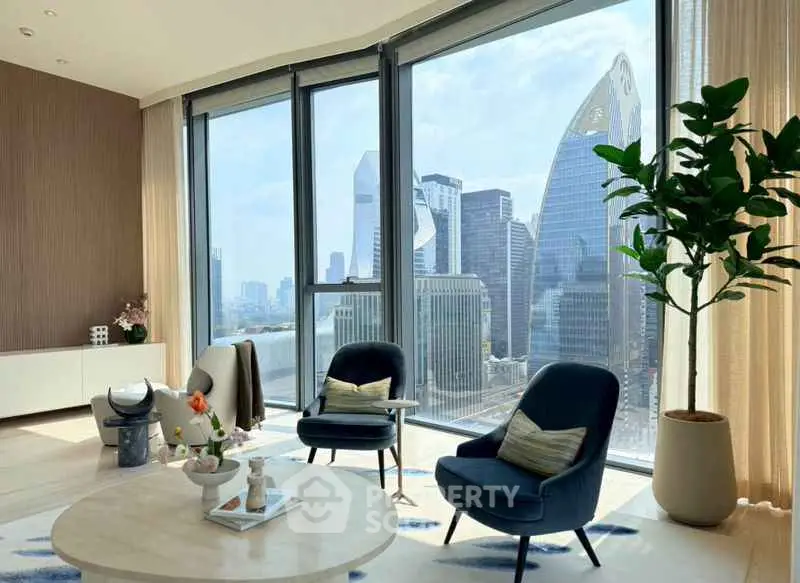 Luxurious living room with stunning city skyline view through floor-to-ceiling windows.