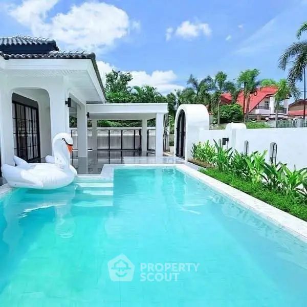 Luxurious villa with private pool and lush garden, perfect for relaxation and entertainment.