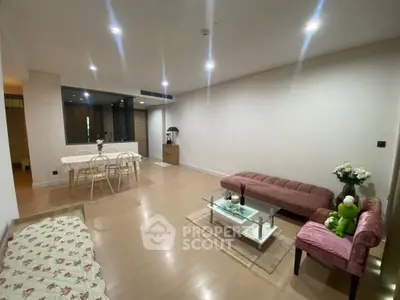 Spacious modern living room with elegant furniture and open layout