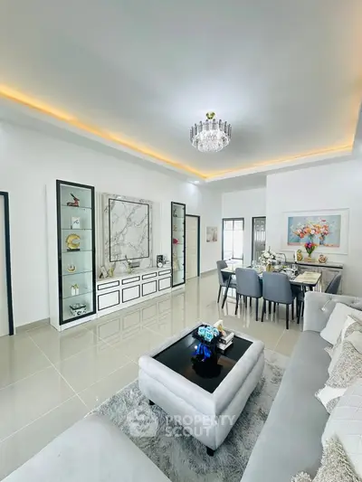 Luxurious modern living room with elegant decor and dining area