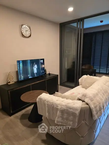 Cozy living room with modern decor and comfortable seating