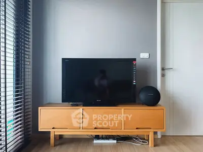 Modern living room with sleek TV stand and stylish decor
