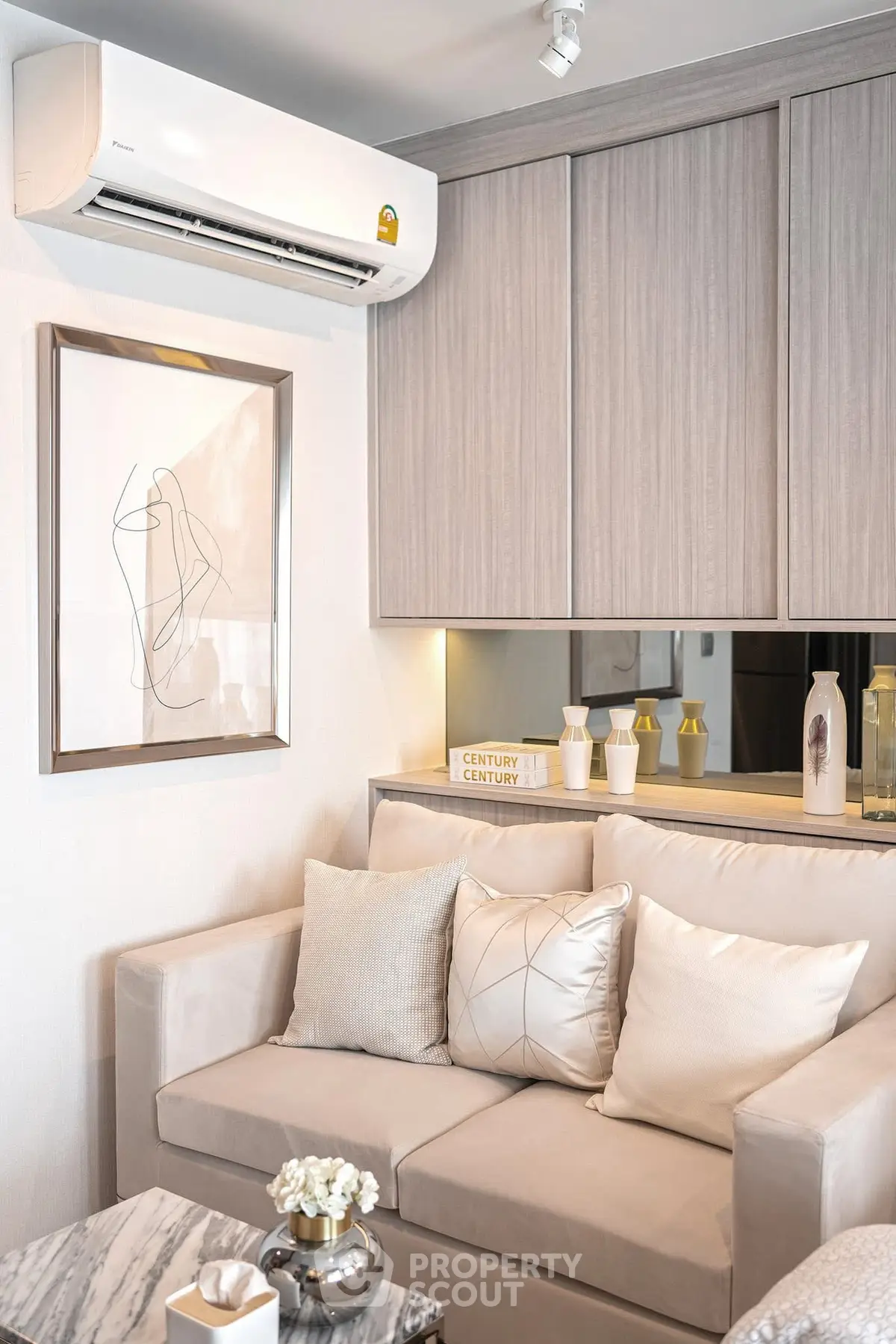 Modern living room with elegant decor and air conditioning