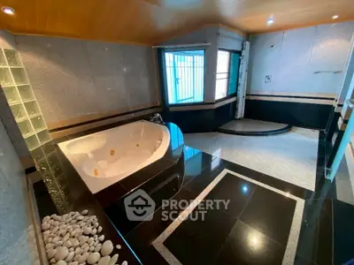 Luxurious bathroom with jacuzzi tub and modern design