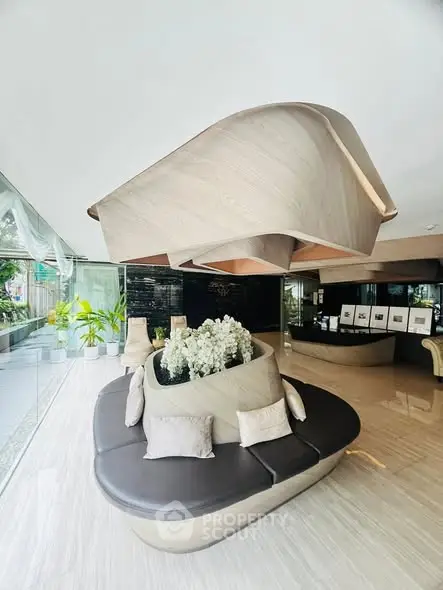 Luxurious modern lobby with unique seating and elegant decor