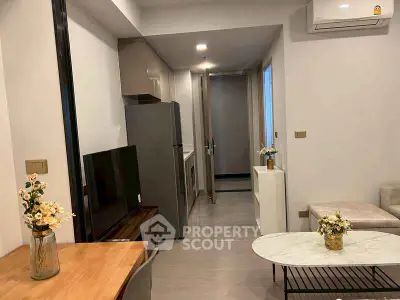 Modern living room with sleek furniture and air conditioning