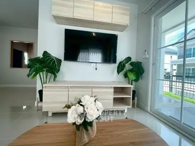 Modern living room with sleek TV setup and stylish decor
