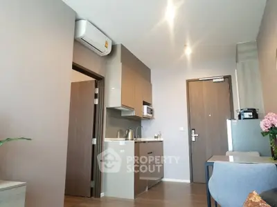 Modern apartment interior with compact kitchen and stylish decor