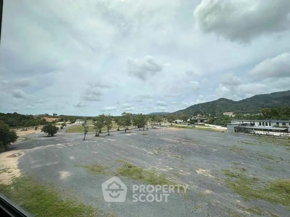 Expansive land with scenic mountain views, ideal for development opportunities.