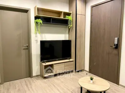 Modern living room with sleek TV unit and stylish decor