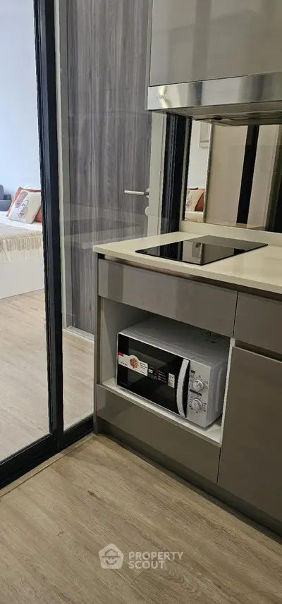 Modern kitchen with sleek appliances and open layout design