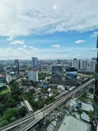 Stunning cityscape view from high-rise building showcasing urban skyline and vibrant city life.