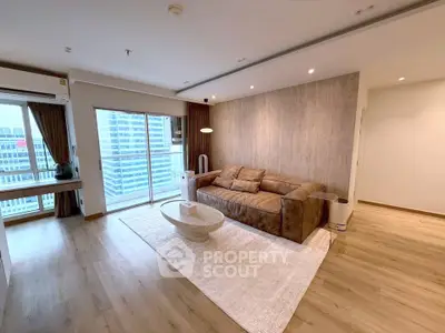 Spacious modern living room with city view and stylish decor