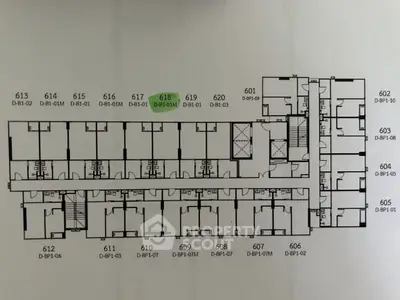 Detailed floor plan of a residential building with unit numbers and layout.