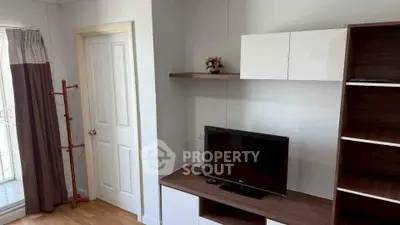 Modern living room with sleek TV unit and stylish shelving, perfect for contemporary living.