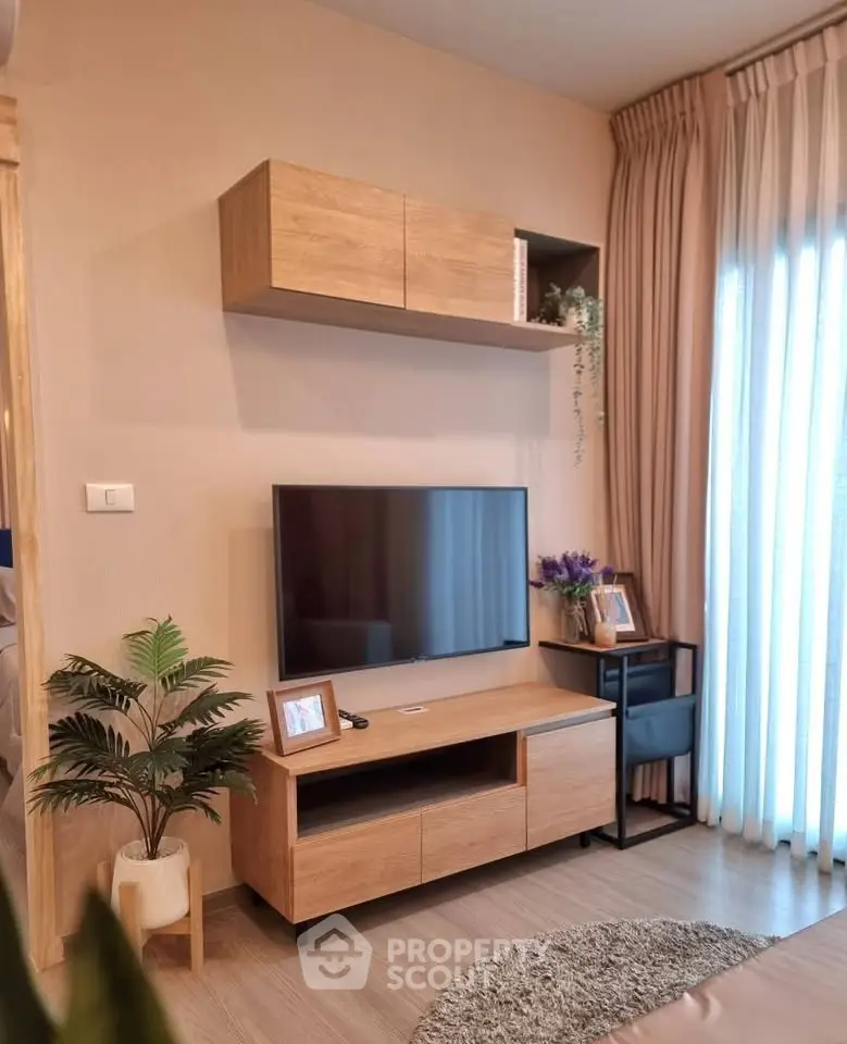 Modern living room with stylish wooden TV stand and elegant decor