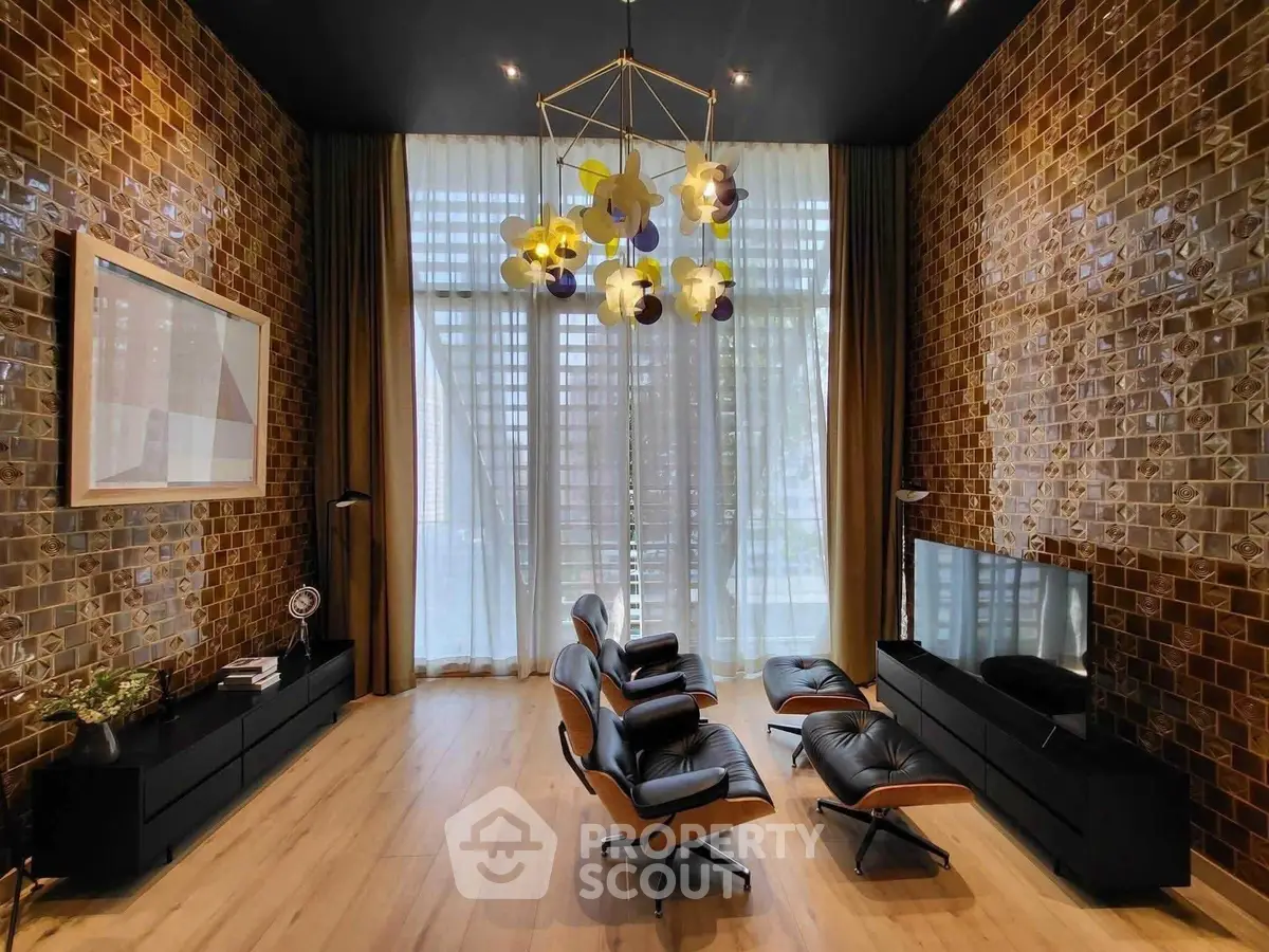 Luxurious living room with modern decor and stylish lighting in a high-end apartment.